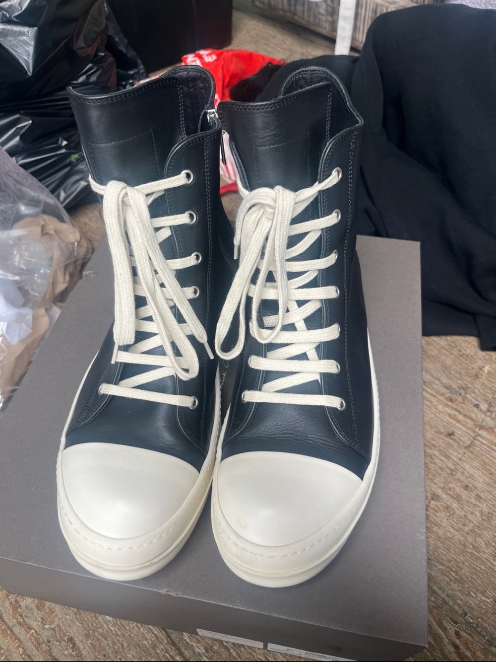 Rick Owens Black Leather High-Top Boat Sneakers with White Toe Caps